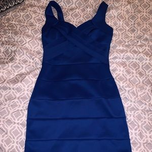 Tight blue dress.